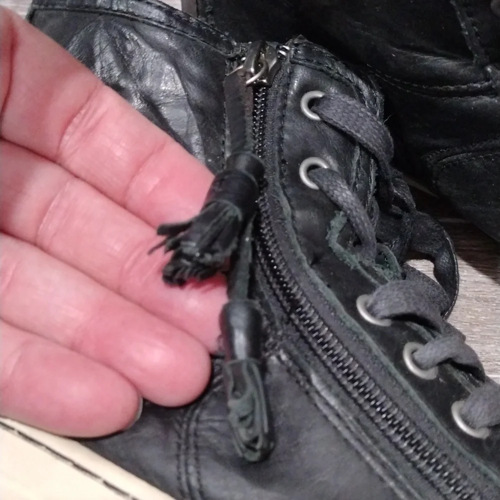 UGG womens black leather zip or lace high top sneakers. Size 8